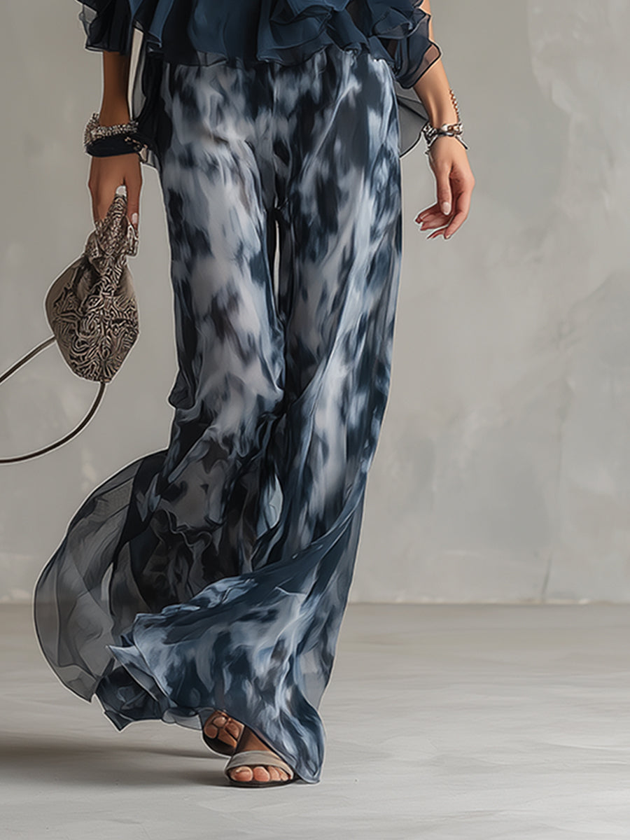Luisa - abito elegante in chiffon con corpetto a collo alto e pantaloni a gamba larga stampati.