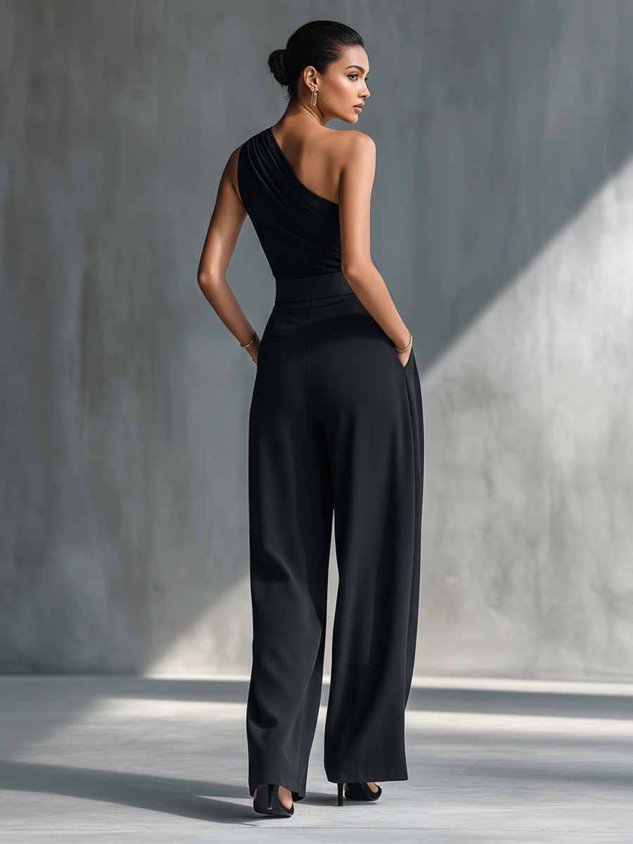 Top da donna in maglia nera altamente elasticizzata e pantaloni larghi in acetato