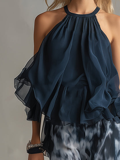 Luisa - abito elegante in chiffon con corpetto a collo alto e pantaloni a gamba larga stampati.