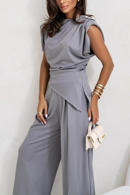 Set due pezzi da donna con top irregolare e pantaloni a gamba larga