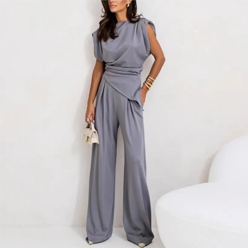 Set due pezzi da donna con top irregolare e pantaloni a gamba larga