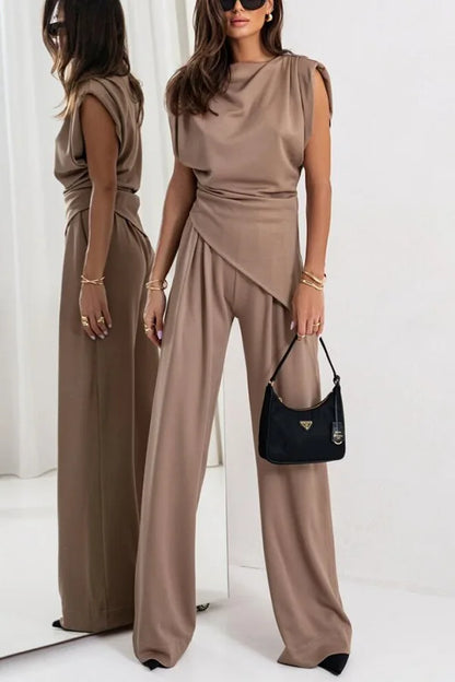 Set due pezzi da donna con top irregolare e pantaloni a gamba larga