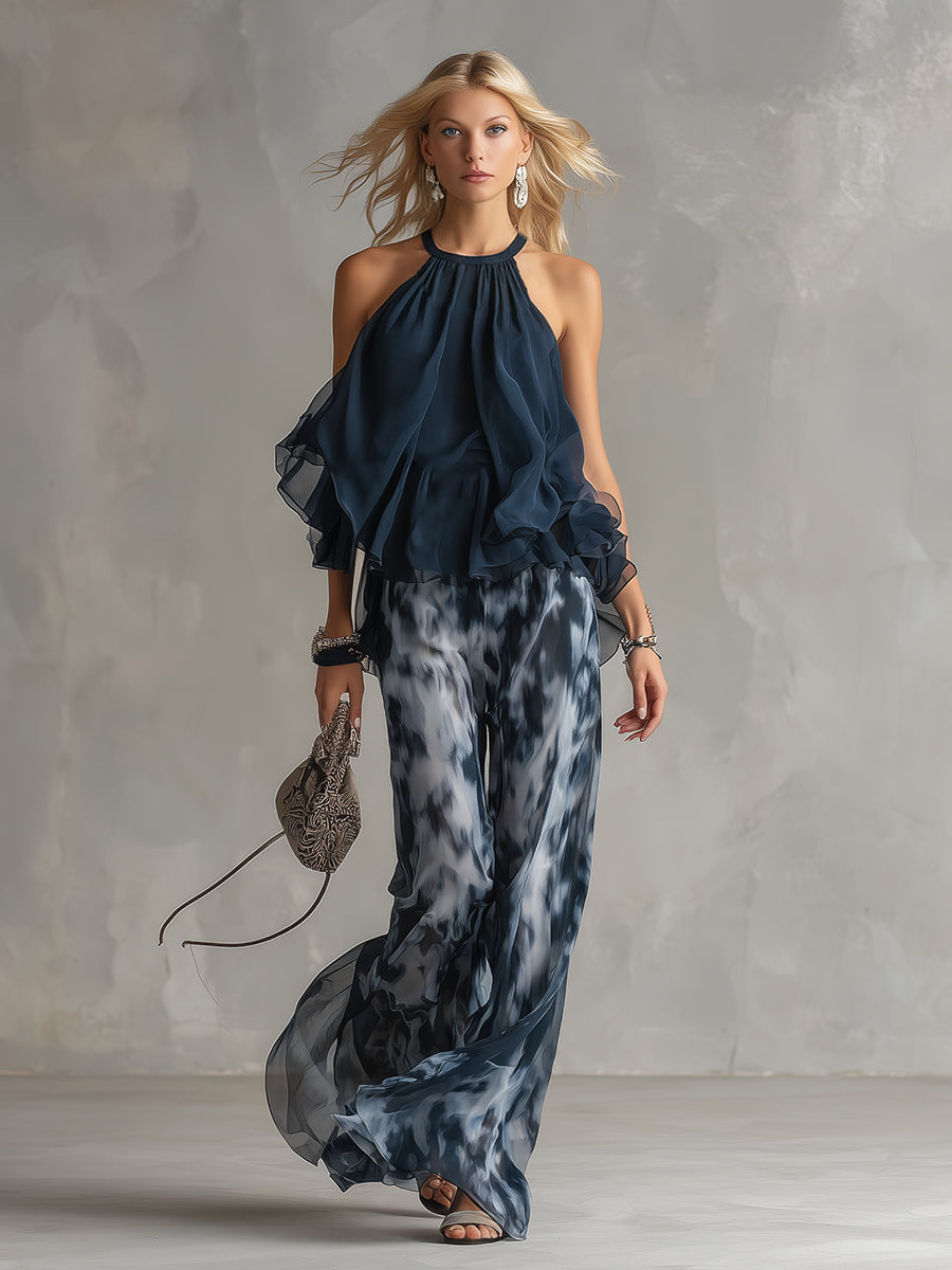 Luisa - abito elegante in chiffon con corpetto a collo alto e pantaloni a gamba larga stampati.