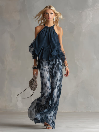Luisa - abito elegante in chiffon con corpetto a collo alto e pantaloni a gamba larga stampati.