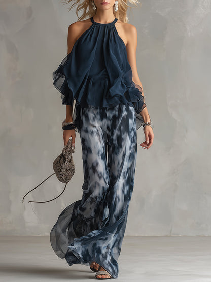 Luisa - abito elegante in chiffon con corpetto a collo alto e pantaloni a gamba larga stampati.